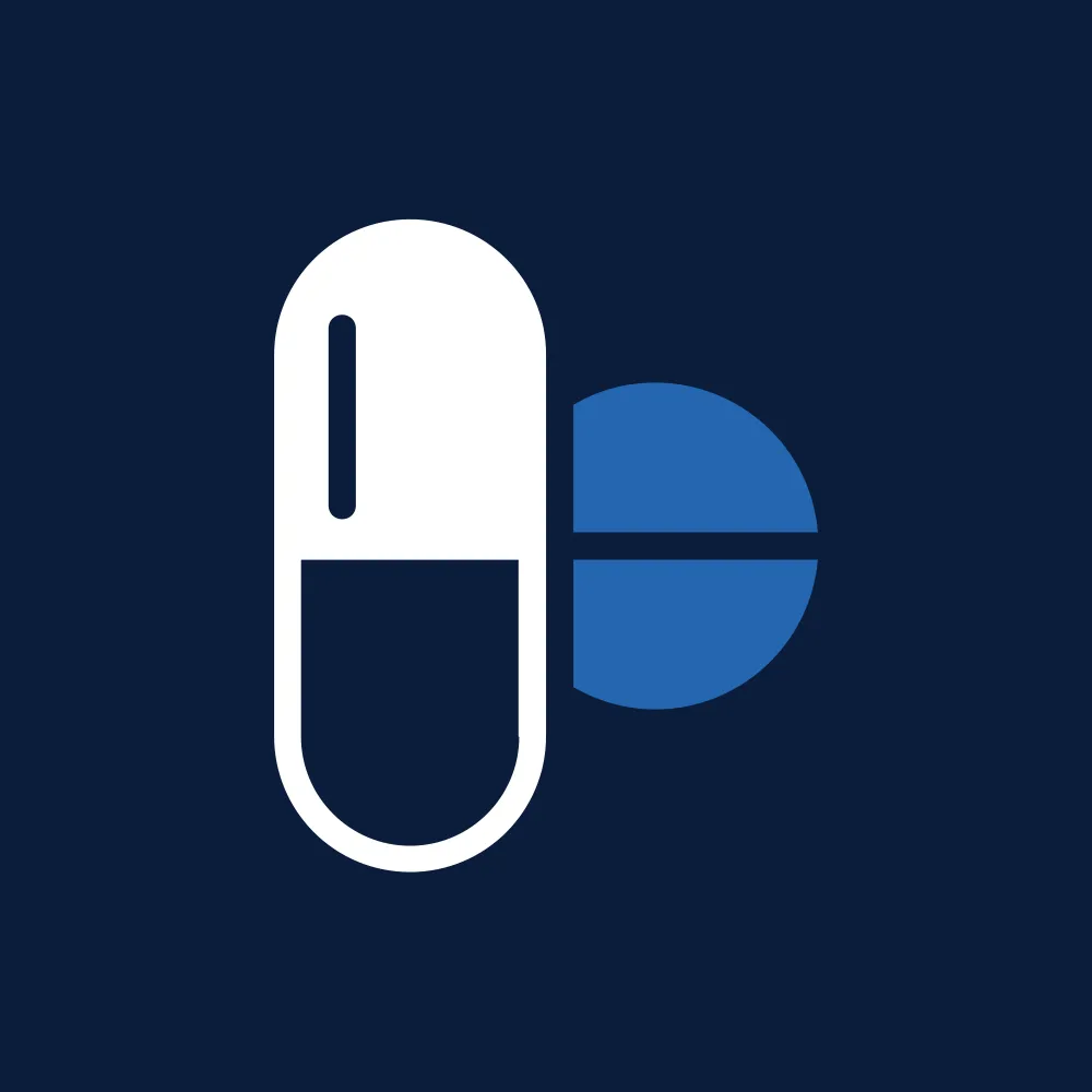 White capsule and blue tablet on a dark blue background.