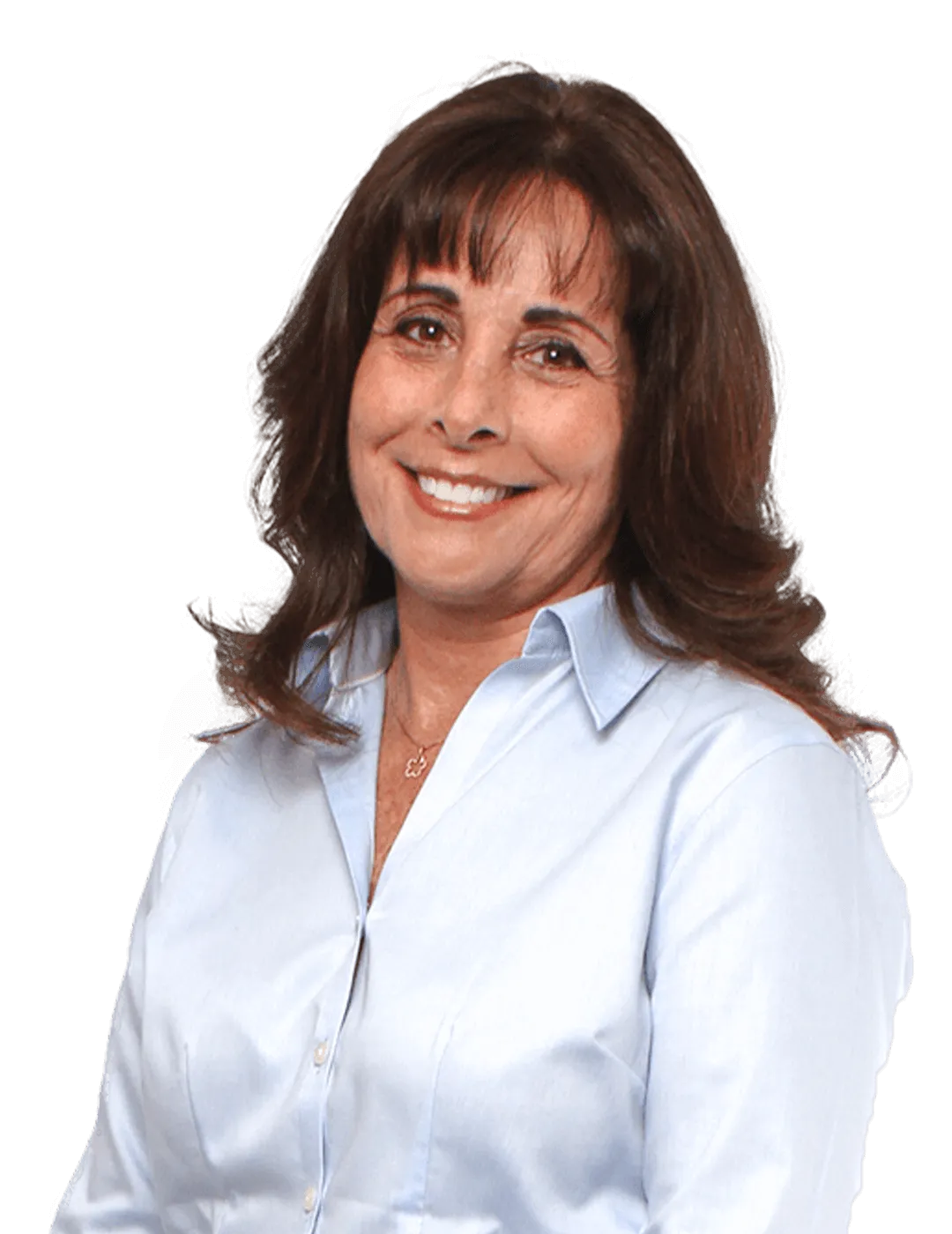 Woman smiling in a light blue blouse.