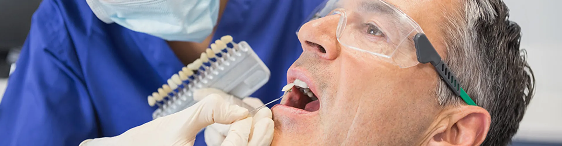 A man getting veneers.